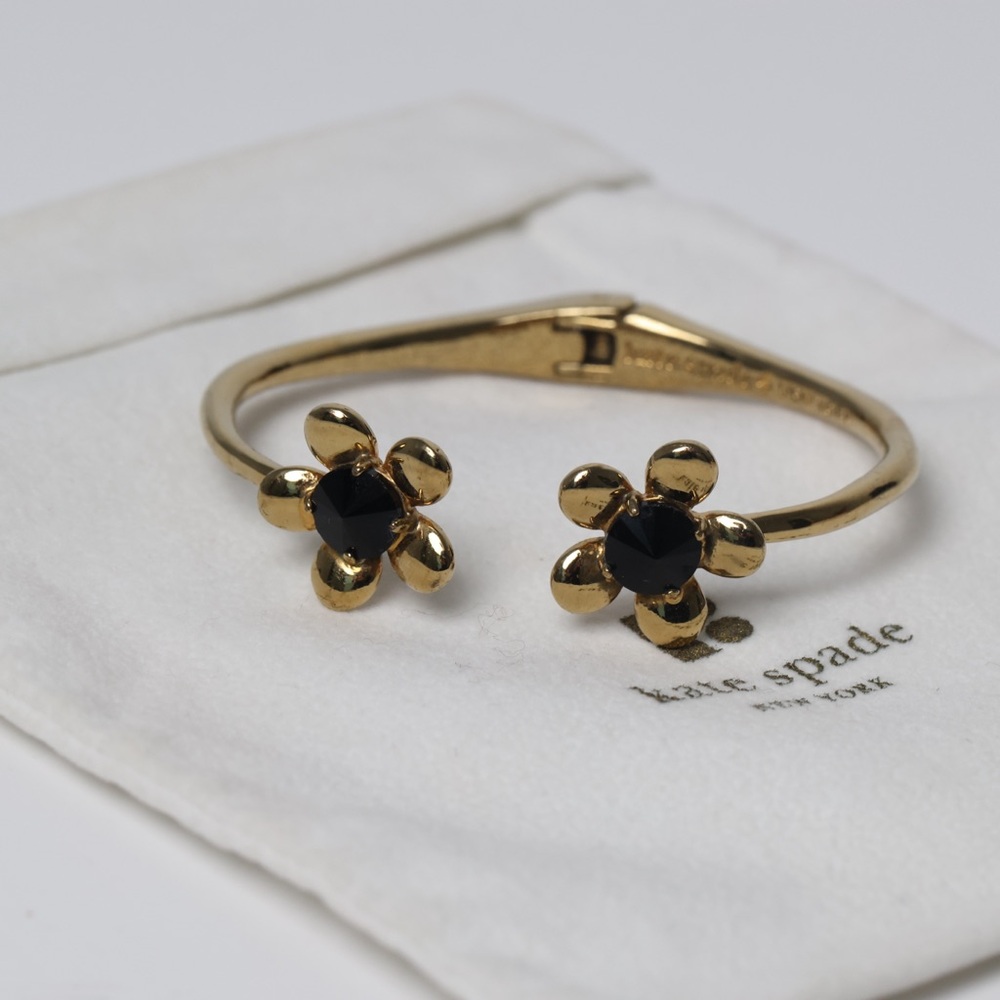 Kate Spade Gold Bracelet with Black Floral Design